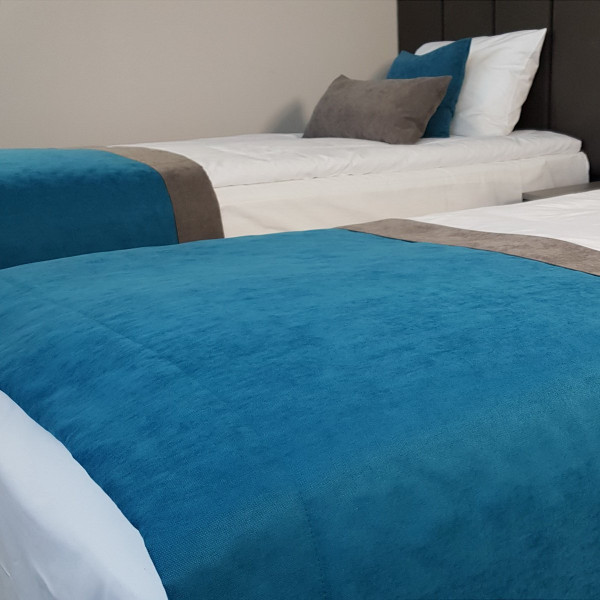 Narzutka hotelowa na łóżko PAS 327 w rozm. 80x170 cm Narzutka hotelowa na łóżko PAS 327 w rozm. 80x170 cm
